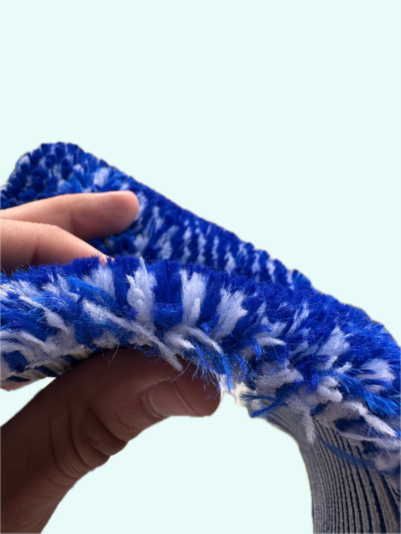 Flexible pile cloth cross section