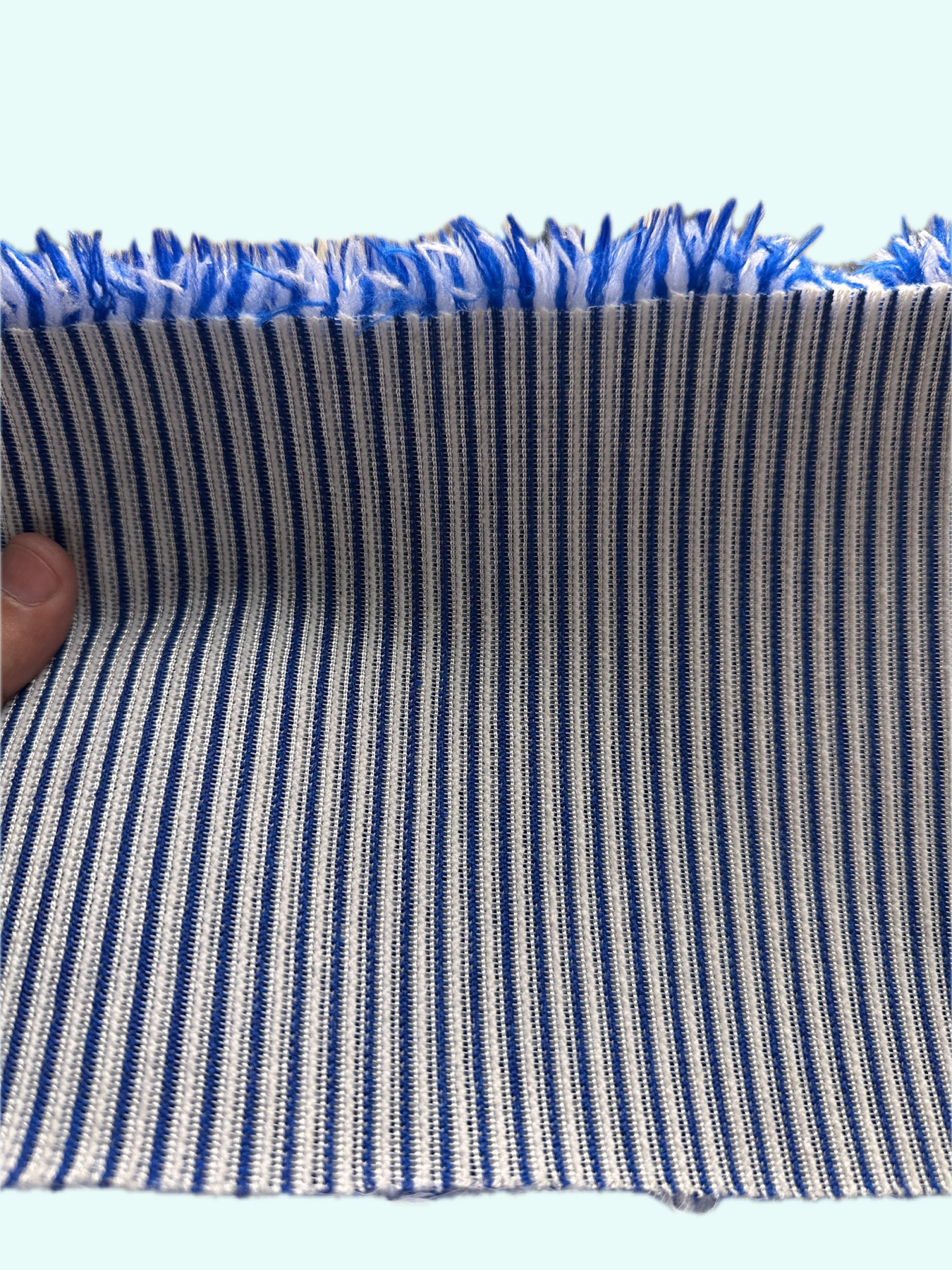 Layered pile cloth media structure